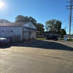Newly paved and striped parking lot in front of The Laundry Room of Stanley in Stanley, NC