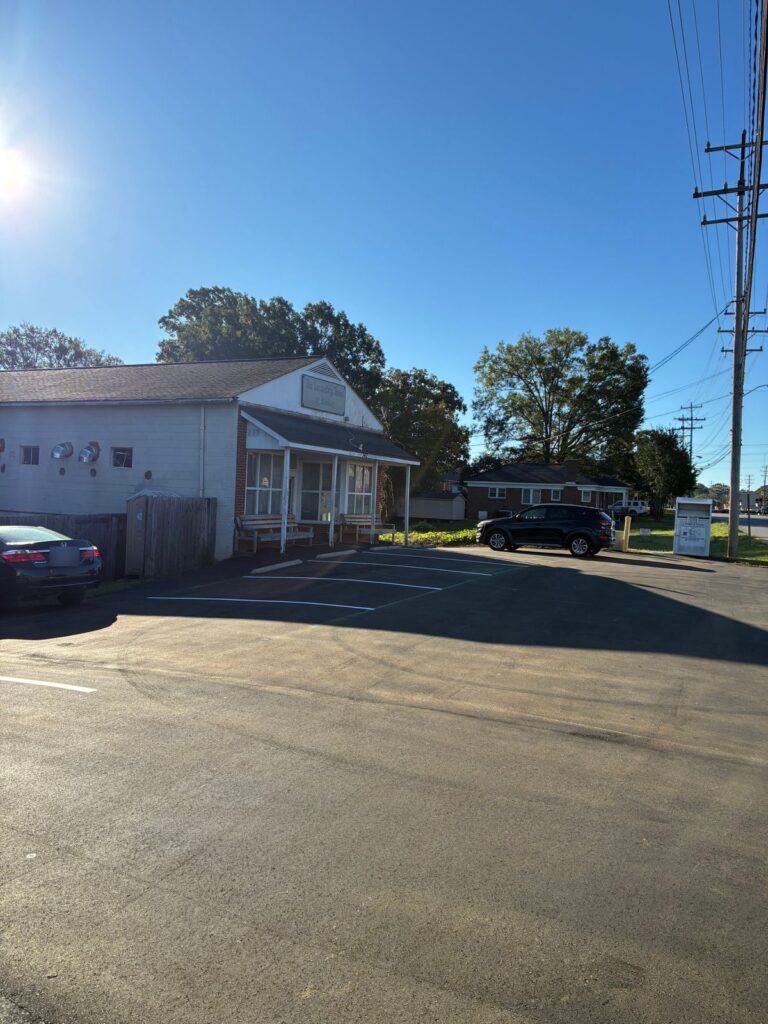 Newly paved and striped parking lot in front of The Laundry Room of Stanley in Stanley, NC